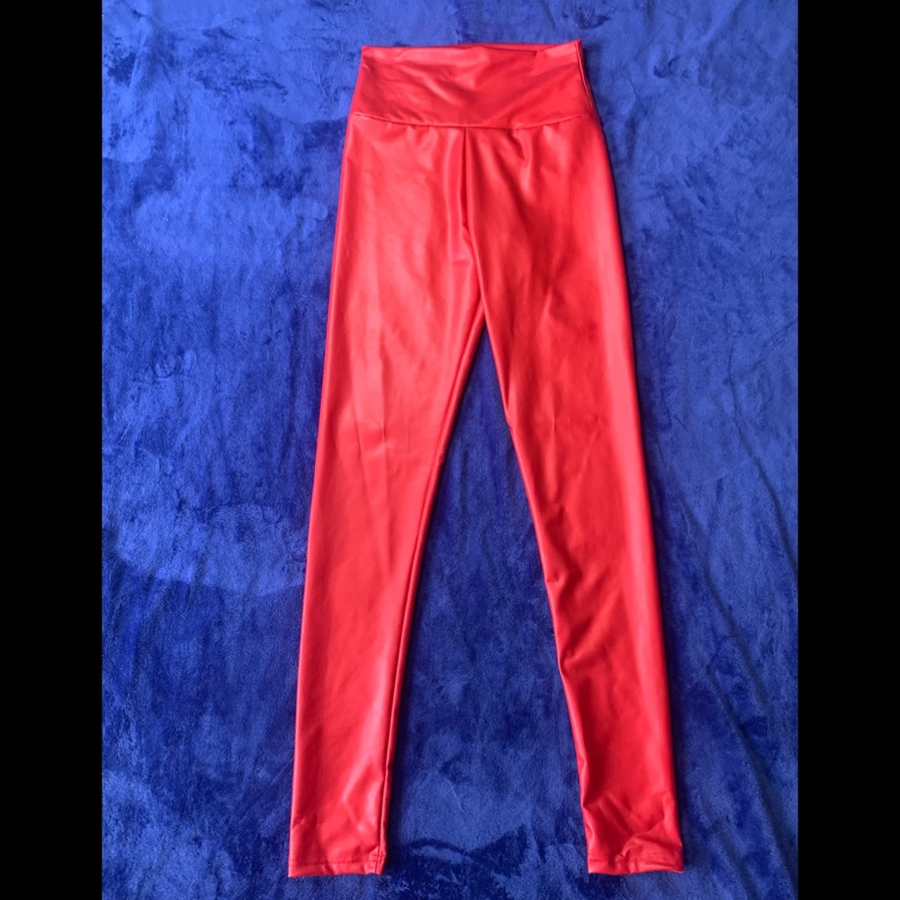 Red faux leather pants